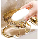 Saboneteira em formato de concha com escorredor para pia de banheiro e cozinha.